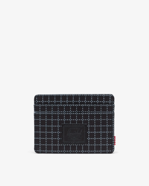 Black and white checkered card holder on a white background