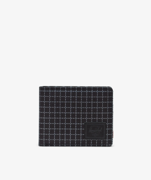 Black and white checkered wallet on a light gray background