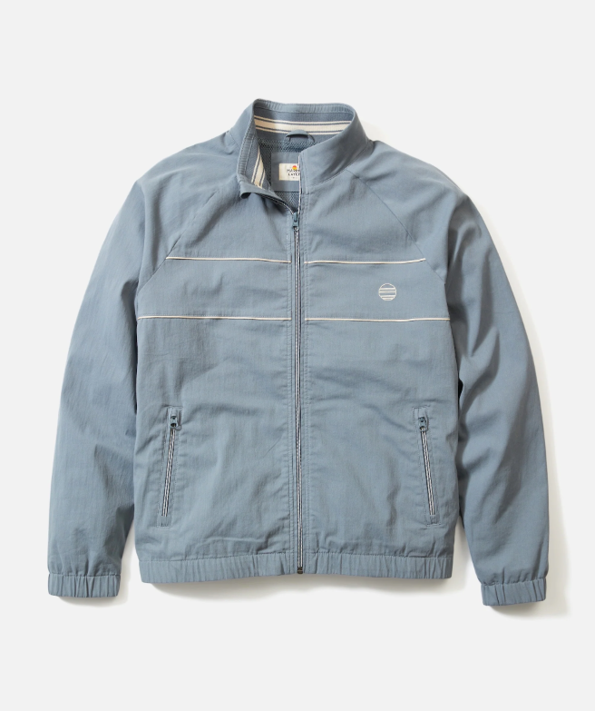 Blue windbreaker on a light gray background