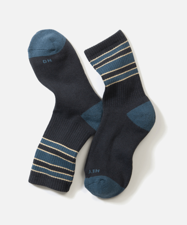 A pair of Men's navy striped socks on a white background