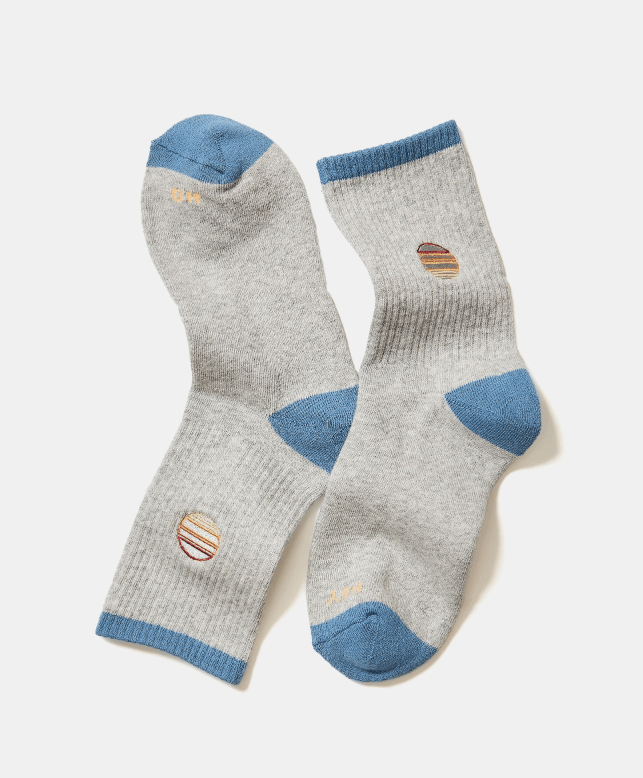 Grey men's gym sock with blue accents and a sun logo on a white background