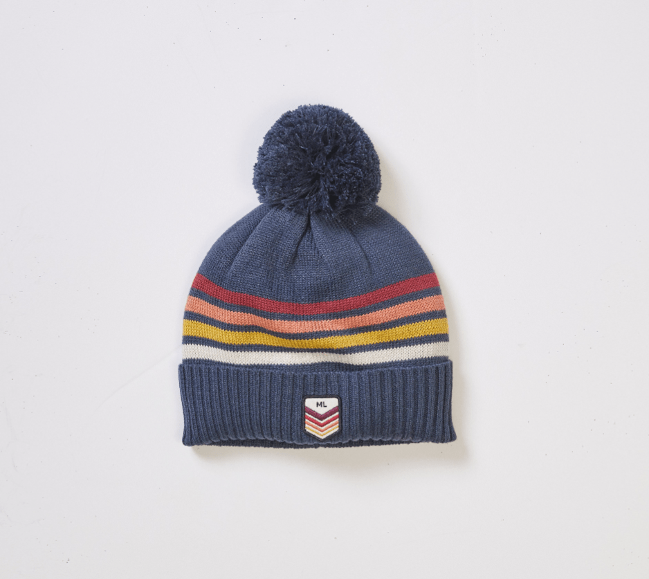 Marine Layer Stripe Pom Beanie in Navy Sunset Stripe - Unincorporated