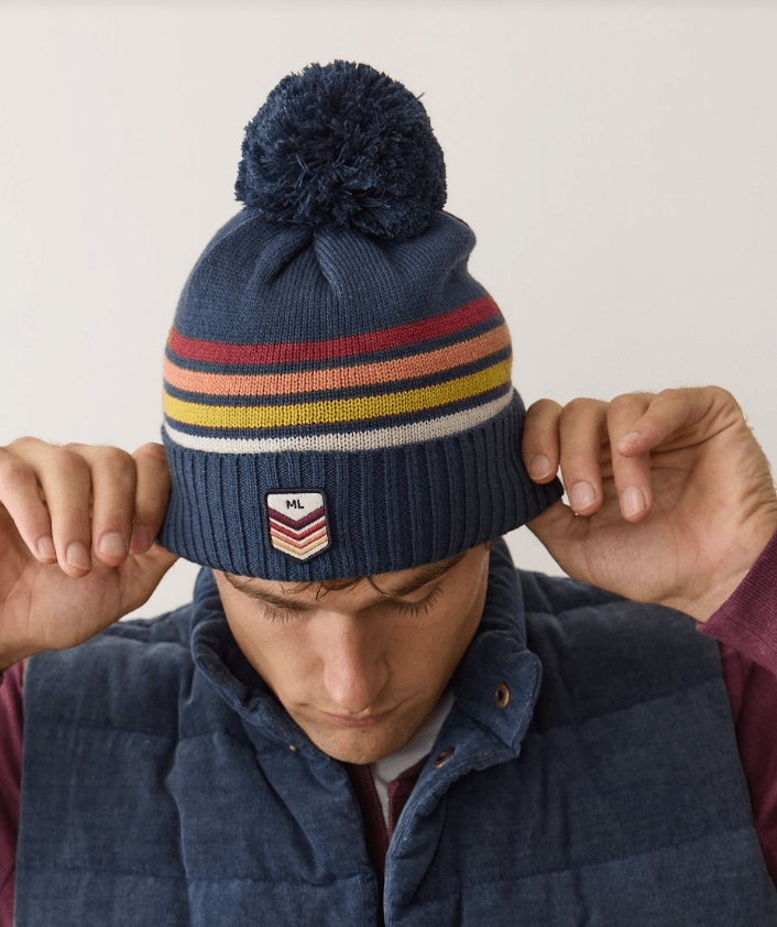 Marine Layer Stripe Pom Beanie in Navy Sunset Stripe - Unincorporated