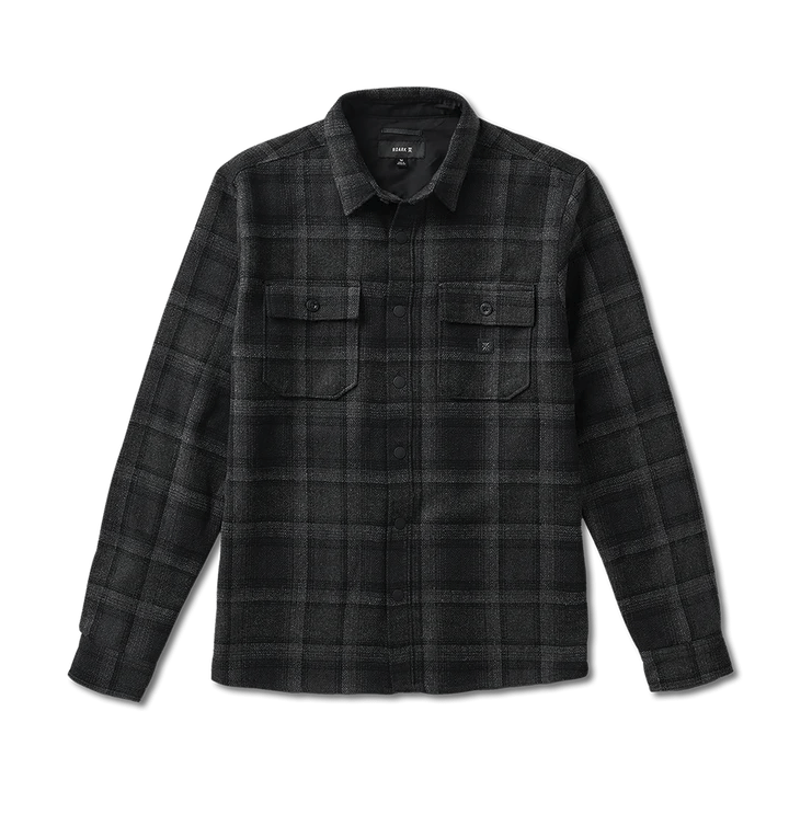 A black plaid flannel shirt on a white background