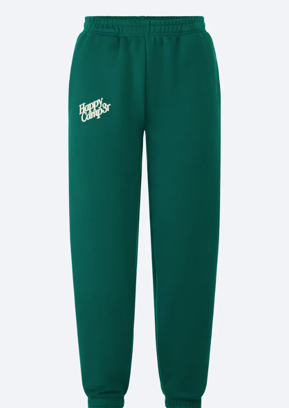 Green sweatpants with 'Happy Camp3r' text on a light gray background